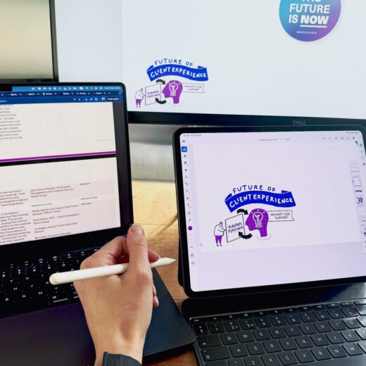 Remote live scribing session in progress, live scribe drawing on a tablet while visuals are projected on screen for virtual event attendees