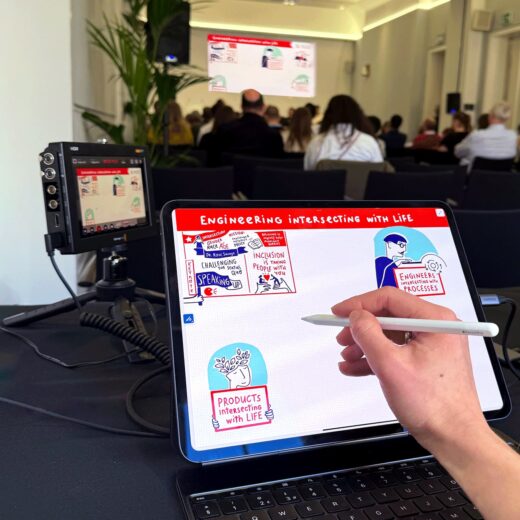Digital live scribing artist illustrating on iPad at a corporate conference
